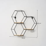 Simple geometric wire frame wall shelves.