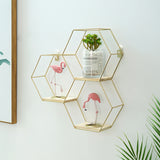 Simple geometric wire frame wall shelves.