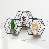 Simple geometric wire frame wall shelves.