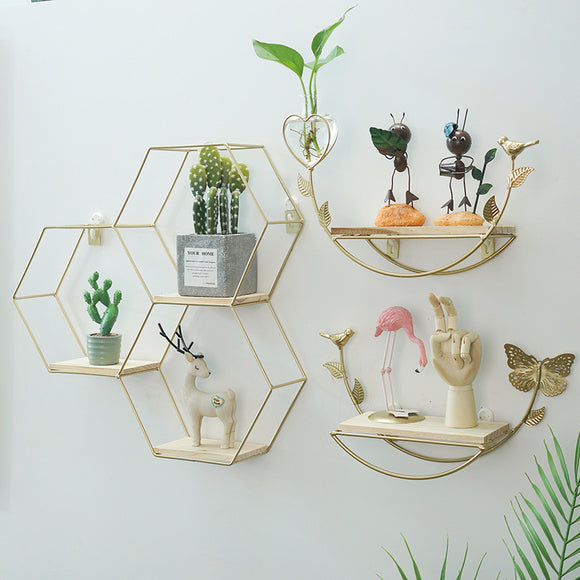 Simple geometric wire frame wall shelves.